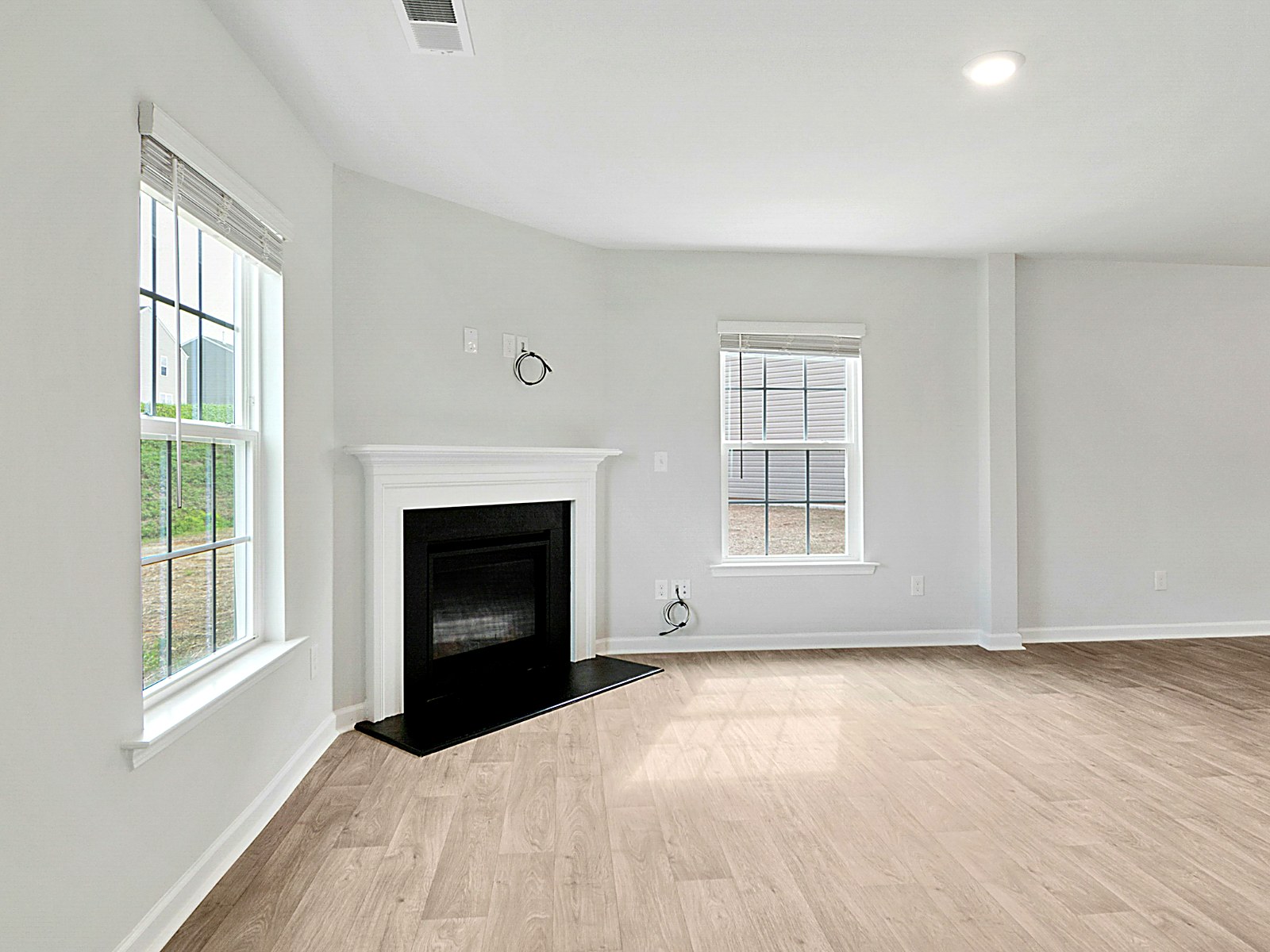 Bright interior repaint with crisp white casings and baseboards