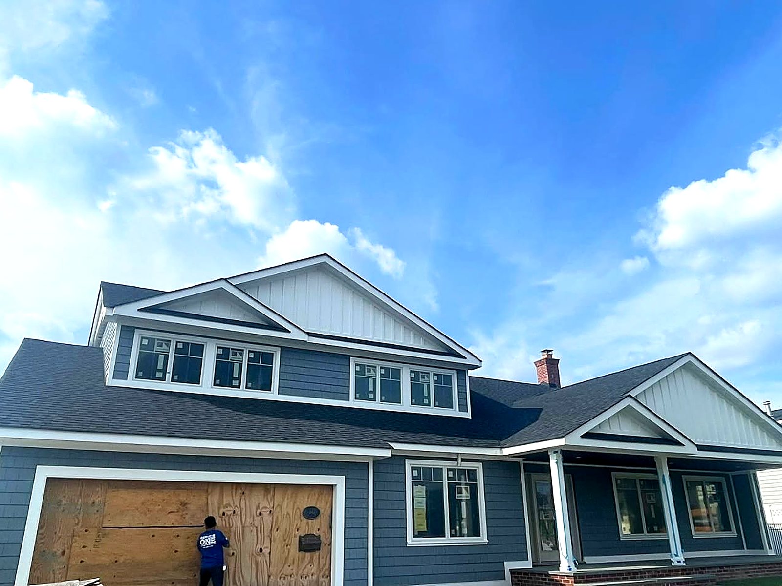 Completed exterior with trim, siding, and finish carpentry details