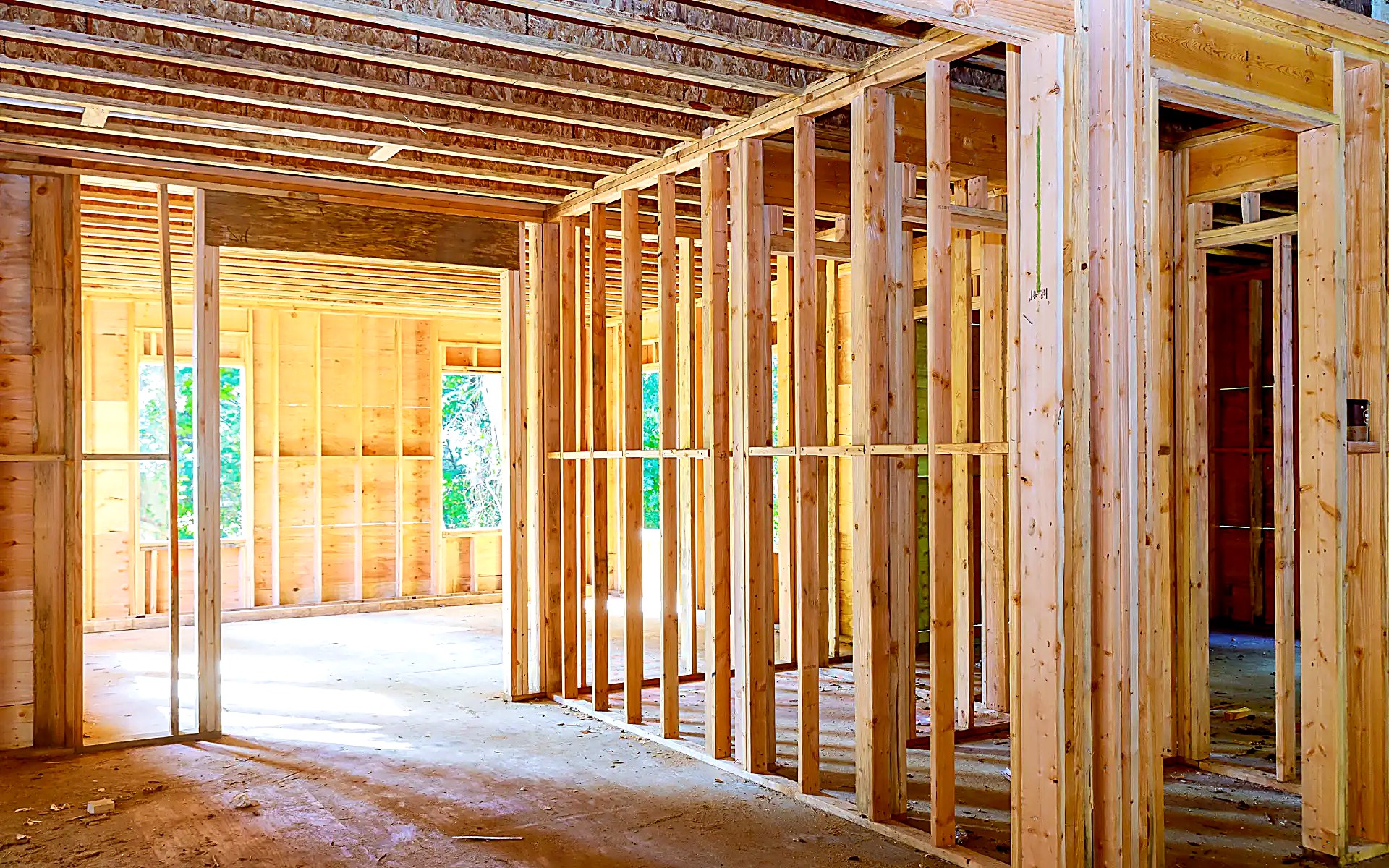Framed openings and partition walls with headers in an open floor plan